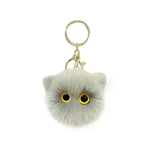 Uunjoy-Llavero de felpa de gato de ojos grandes, mini colgante suave de 8cm, máquina expendedora de garra