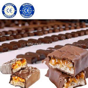 Ligne <span class=keywords><strong>de</strong></span> production entièrement automatique <span class=keywords><strong>de</strong></span> barres <span class=keywords><strong>Snickers</strong></span> / barres <span class=keywords><strong>de</strong></span> granola au <span class=keywords><strong>chocolat</strong></span> / barres <span class=keywords><strong>de</strong></span> <span class=keywords><strong>chocolat</strong></span> sucré - Product Image 2
