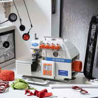 Nouvelle machine à coudre industrielle à surjet à 4 fils, lit plat à grande vitesse avec formation de point de surjet à alimentation en aiguille