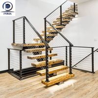 Escalier flottant moderne Prima avec marches en bois et main courante pour villas résidentielles et projets commerciaux intérieurs