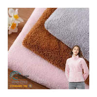 Tissu polaire de couverture de corail 100% polyester 270gsm tricoté par chaîne de sentiment doux teint par plaine