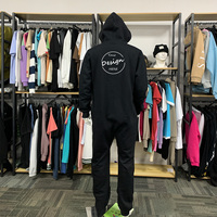 Combinaison pour homme en molleton de coton uni brodé sur mesure Barboteuses Pyjamas à capuche avec fermeture éclair complète Survêtement une pièce avec poches