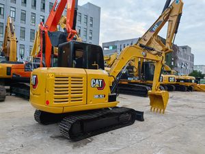 Used CAT 305.5E2 Mini Crawler Excavator 5 Ton Digger With Closed Cabin and Dozer Blade - Product Image 1