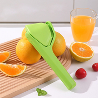 Handmatige citruspers, draagbare handpers voor citroen, limoen en sinaasappel, mini fruitsapcentrifuge