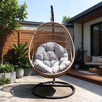 Fauteuil suspendu en rotin PE avec support en métal, design moderne pour salon et cour, chaise balançoire d'extérieur avec coussin