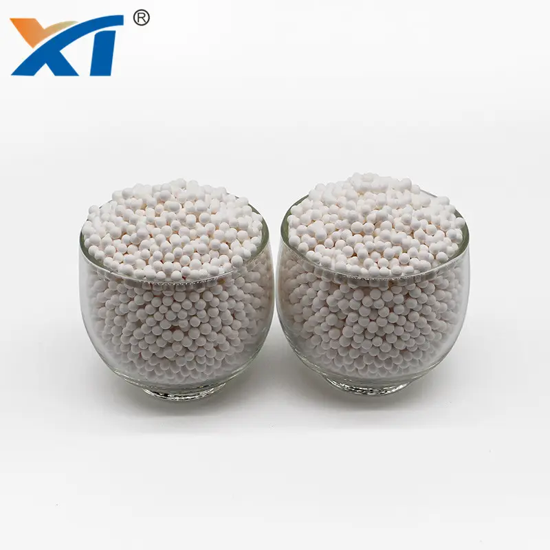 Xintao 2-3mm活性アルミナビーズ乾燥剤顆粒水処理用フッ素吸収