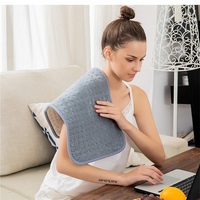 Couverture chauffante d'hiver électrique grise portable chaude avec coussin chauffant électrique à usage domestique