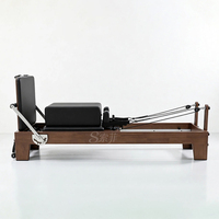 Reformer Pilates en chêne, machine de Pilates pliable pour yoga et Pilates, fabricant d'usine