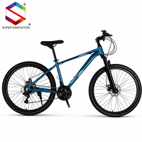 Vélo de montagne à suspension avant, frein à disque, transmission multi-vitesses, pneus à crampons, vélo tout-terrain