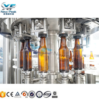 Nouvelle machine de remplissage et de bouchage de bouteilles en verre Peak Complete Bee pour l'embouteillage de bière en verre dans les usines de remplissage