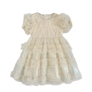 2024 Boutique fantaisie Design couleur unie perlée fille robes fête d'anniversaire vêtements enfant robe d'été porter avec nœud