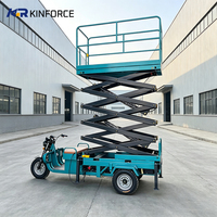 Plateforme élévatrice à ciseaux tricycle la plus vendue, plateforme aérienne hydraulique mobile électrique pour les projets de maintenance des lampadaires autoroutiers