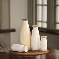 Bouteille de lait de yaourt en verre pasteurisé 200ml 250ml 300ml 500ml 1000ml Bouteilles d'emballage en verre de qualité alimentaire avec bouchon en plastique en aluminium