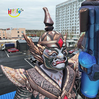 Statues de gardien thaïlandais géant de Bangkok Yaksha gonflable bleu avec pistolet à eau