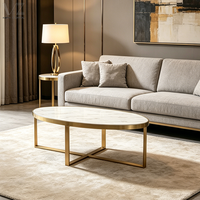 Table basse ovale de luxe moderne en acier inoxydable doré avec plateau en marbre artificiel pour salon, design tendance