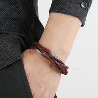 Nouveau modèle de bracelet à fermoir magnétique en acier inoxydable, bracelet en cuir vintage tissé à la main