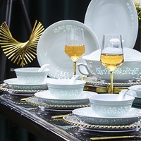 Service de table en porcelaine de Jingdezhen, céladon Linglong ajouré, motif lotus entrelacé, vaisselle en céramique, cadeau de mariage, ensemble de bols et assiettes