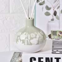 Vase à fleurs en céramique émaillée de style élégant Bouteille de diffuseur d'arôme de roseau en céramique