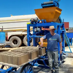 qt4-24 used concrete brick making machine,hollow block making machine in brazil