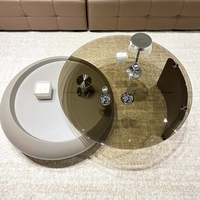 Table basse en verre élégante et contemporaine avec base arrondie unique Meubles de maison pour espaces de vie modernes et décoratifs