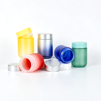 Flacon de complément alimentaire en verre givré multicolore personnalisé avec couvercle en métal électroplaqué pour l'emballage de vitamines et d'aliments santé
