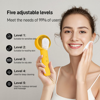 Brosse nettoyante électrique chauffante en silicone souple pour le visage, double face, portable, fabricant OEM en gros