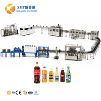 Ligne de production de mise en bouteille automatique 3 en 1 pour boissons gazeuses, service de projet clé en main professionnel 12000BPH
