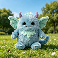 Vente en gros de peluches monstres douces très populaires, jouet en peluche monstre bleu mignon de dessin animé avec queue, peluche personnalisée