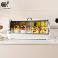 Plateau de présentation de buffet en acier inoxydable et céramique Oulu avec couvercle à roulettes pour desserts, pâtisseries, salades de fruits - Utilisation pour la restauration et les fêtes