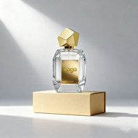 Flacon de parfum vide en verre transparent de luxe de 100 ml avec pompe pulvérisatrice, design unique, couleur personnalisée, couvercle doré et emballage en boîte
