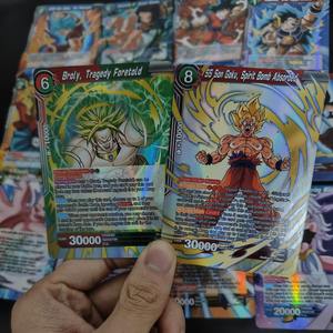 100 unids/caja versión en inglés. DBZ Son Goku Son Gohan <span class=keywords><strong>Piccolo</strong></span> Trunks recoger personaje niños caja ciega Anime <span class=keywords><strong>juego</strong></span> de cartas Tarjeta de papel SSR - Product Image 5