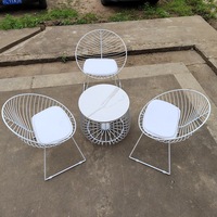 Ensemble de mobilier d'extérieur pour réceptions et loisirs, style influenceur, pour villa de cour nordique, comprenant tables et chaises en fer forgé et table basse en pierre de porcelaine