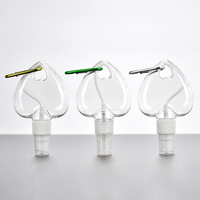 Mini flacon de voyage transparent en forme de cœur avec mousqueton, conteneur vide rechargeable en PET à presser pour désinfectant pour les mains et cosmétiques
