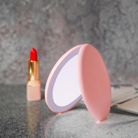 Vente en gros de poche miroir cosmétique LED avec lumière miroir grossissant 2X miroir lumineux LED miroir de maquillage portable