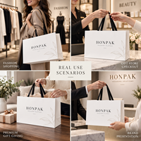 Sac de shopping en papier horizontal de grande taille HONPAK, sac d'emballage personnalisé pour vêtements avec poignée en ruban pour les magasins de vêtements
