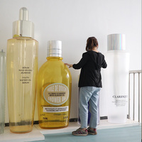 Accessoires de présentation pour bouteilles de soins de la peau géantes Sculptures publicitaires personnalisables
