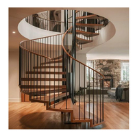 Escalier intérieur en colimaçon en fer forgé pour petits espaces moderne et compact