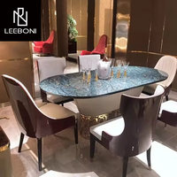 Nouvelle tendance de meubles de luxe Table de salle à manger ovale moderne avec cadre en acier inoxydable et verre
