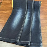 Tissu denim sergé Lizhi Slub indigo, couleur de base noir-gris, 4-5% de rétrécissement en trame, extensible, respirant, résistant à l'abrasion, pour garçons