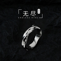 Bague Mobius tendance pour homme Bague tendance en acier inoxydable à aile unique plaquée argent pour garçon Durable et élégante