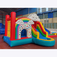 Château gonflable en PVC avec toboggan arc-en-ciel, location commerciale, fabrication OEM