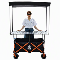 Chariot de camping pliable à quatre roues avec table réglable en hauteur et toit pare-soleil pour le shopping et le stockage, OEM disponible