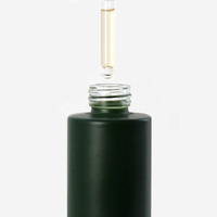 Flacon compte-gouttes en verre avec bouton-poussoir en bambou personnalisé de luxe avec couvercle en bambou pour l'emballage d'huiles essentielles, de sérums et de cosmétiques
