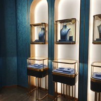 Vitrine murale et sur pied à deux niveaux pour bijoux, cadre or champagne, éclairage LED, pour magasin de diamants