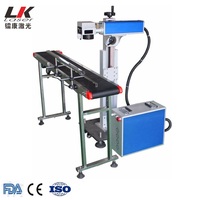 Machine d'impression laser de marquage laser CO2 en ligne volant impression de bouteilles en plastique