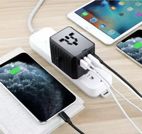 Adaptateur de voyage multi-national avec chargeur USB pour prises EU/UK/US/AU