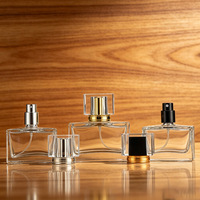 Flacon de parfum en verre transparent rectangulaire de luxe de haute qualité Eric, vide, 30 ml, 50 ml, 100 ml, avec bouchons et vaporisateur.