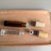 Flacon roll-on de luxe écologique en verre dépoli transparent 5ml 10ml pour parfum et huiles essentielles avec couvercle en bambou et logo gravé – Cosmétique