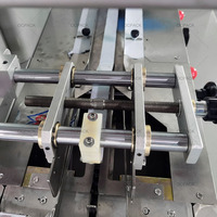 Machine d'emballage de bonbons, Emballeuse automatique de type oreiller pour chocolats, sucettes et snacks aux dattes, Équipement de flow-package servo-contrôlé