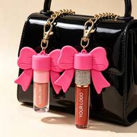 Porte-clés mignon avec capuchon en forme de nœud pour brillant à lèvres, brillant à lèvres végétalien, waterproof, longue tenue, hydratant, huile à lèvres marque privée